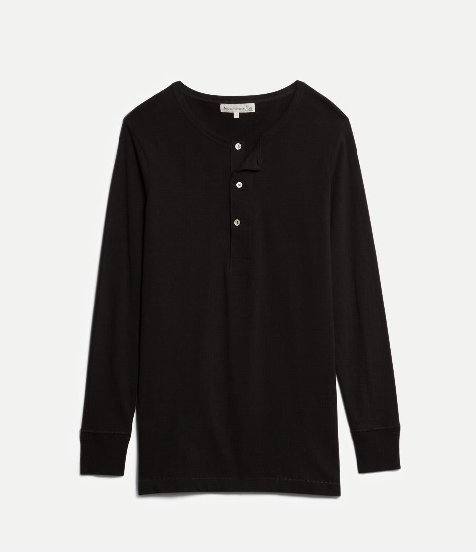 Black long-sleeve shirt with buttons on a white background