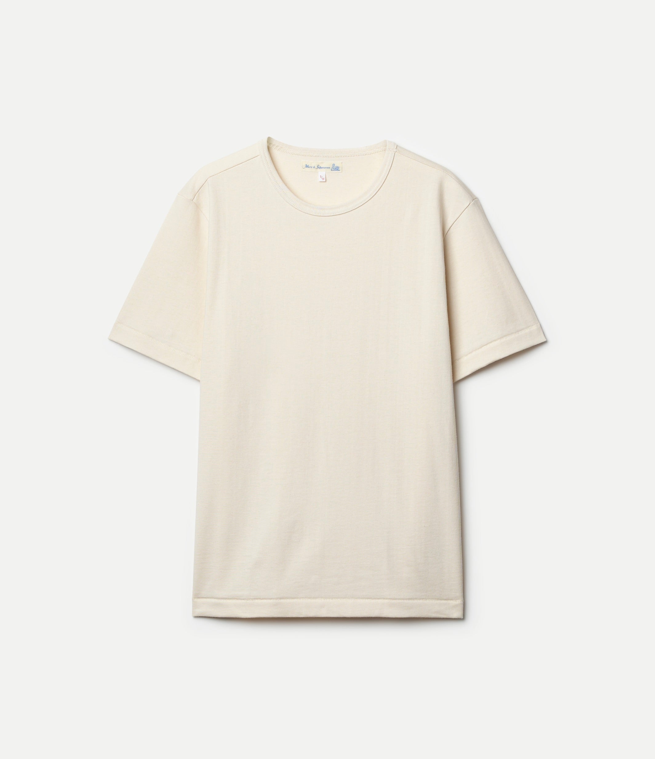 Beige T-shirt on grey background