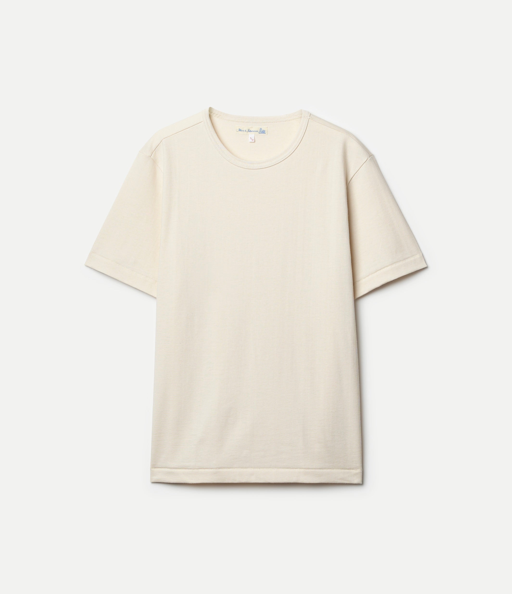 Beige T-shirt on grey background