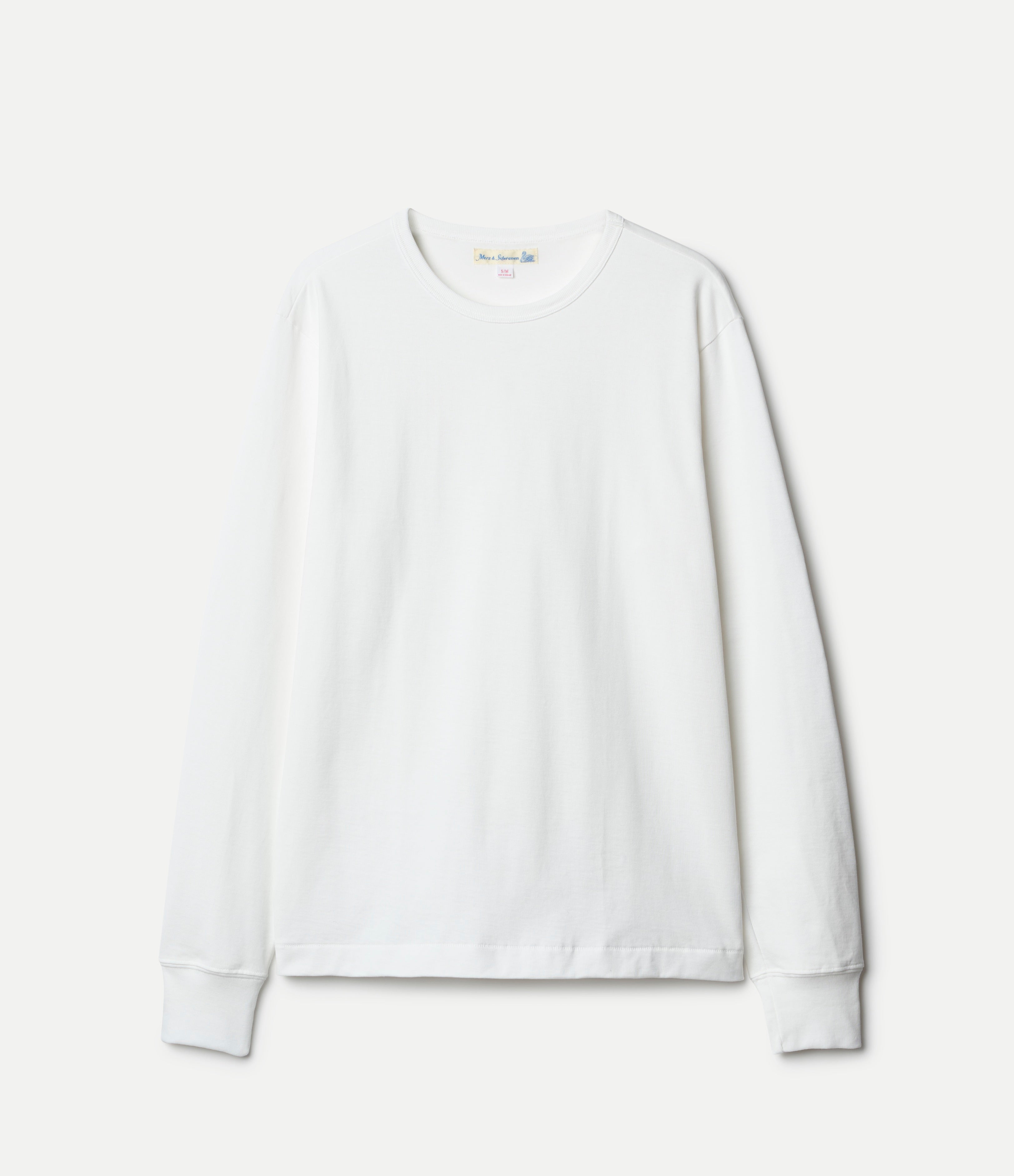 White longsleeve shirt on a light gray background