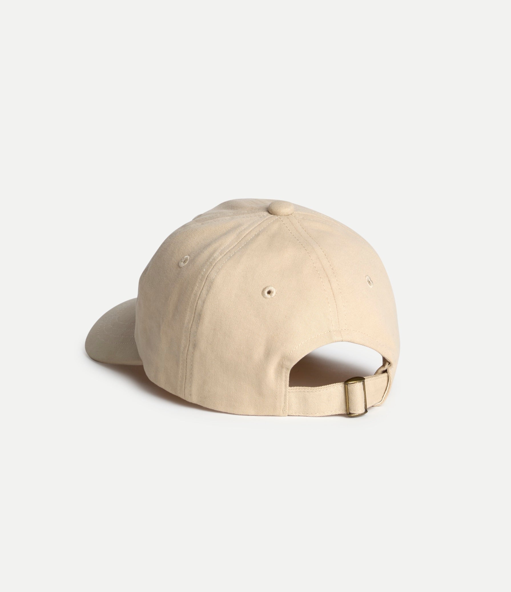 Beige baseball cap on a light gray background