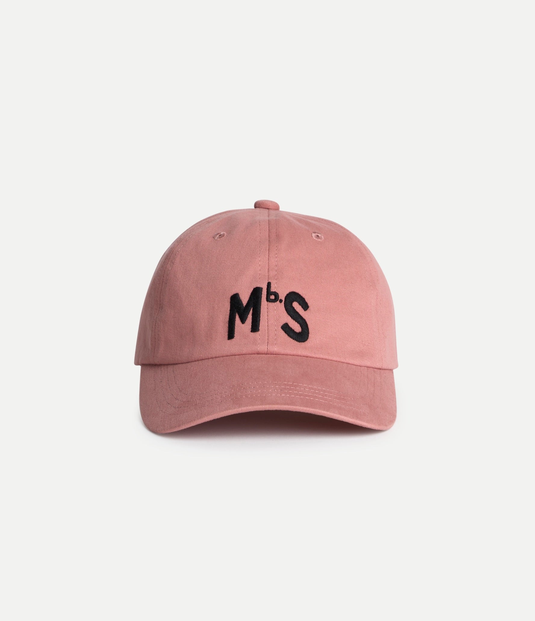 Pink baseball cap on a light gray background