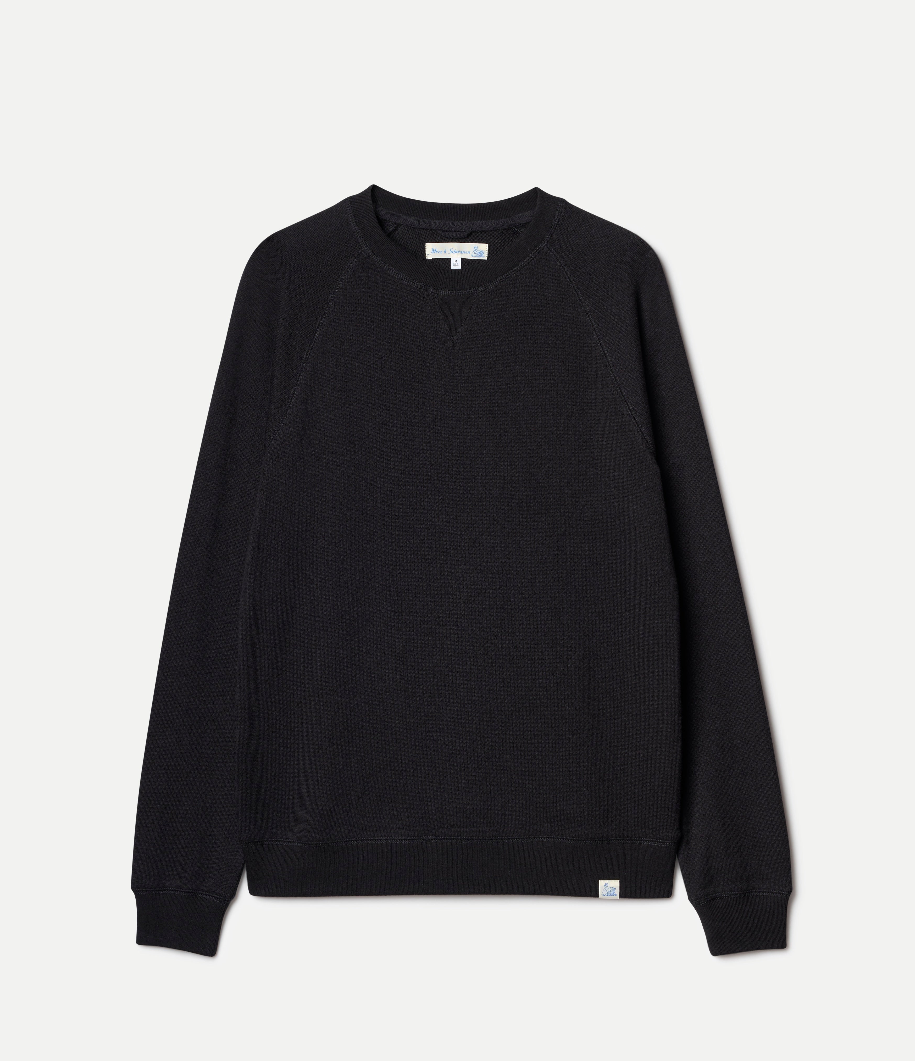 Black sweatshirt on a light gray background