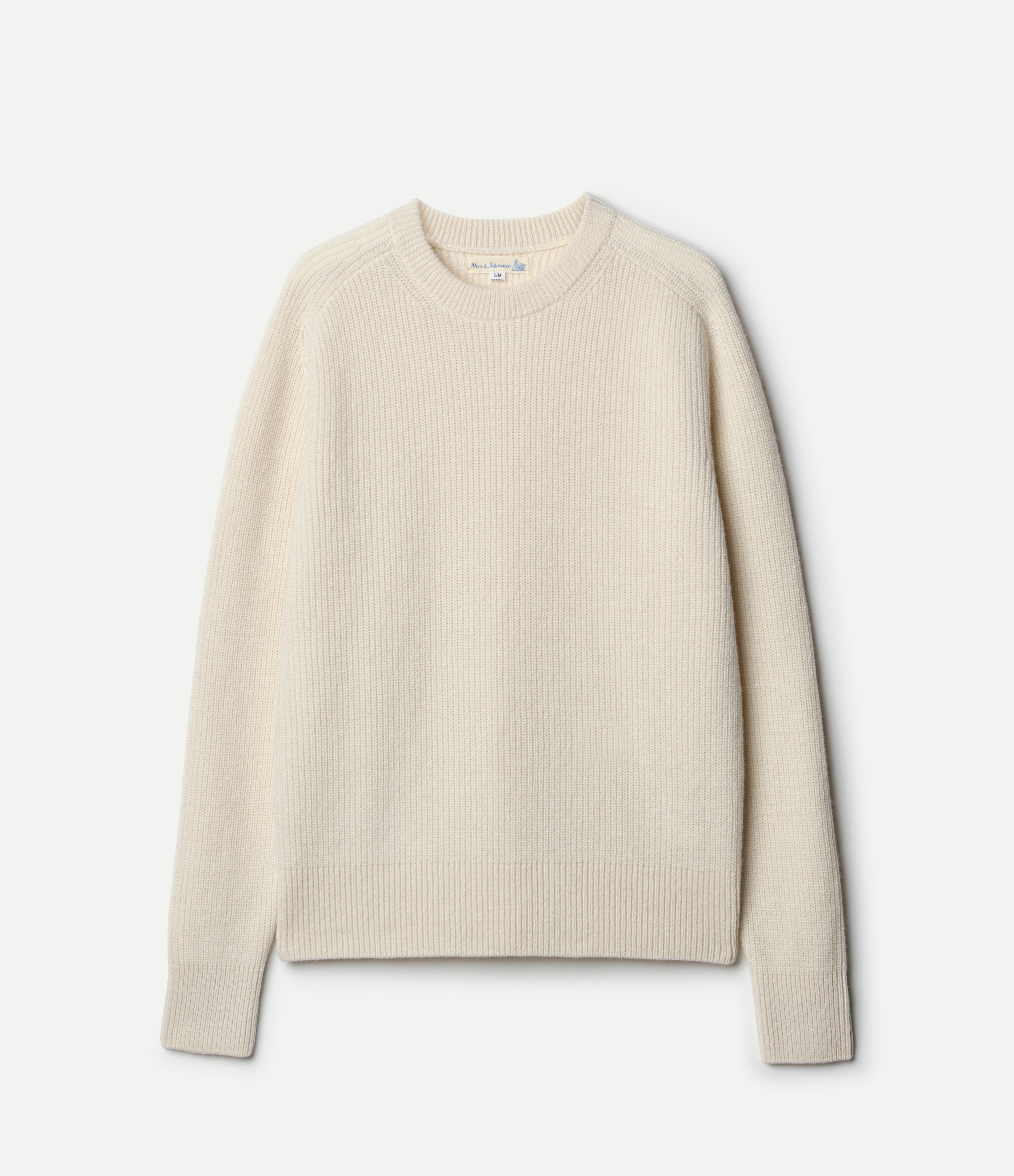 Beige ribbed sweater on a white background