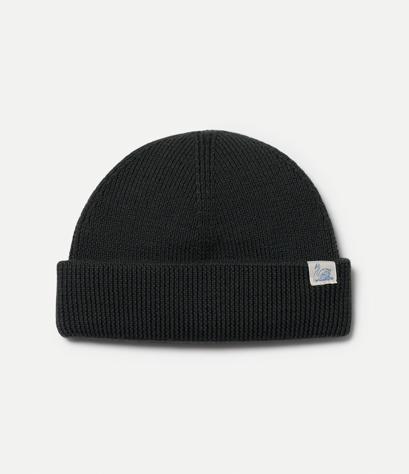 Army green merino wool beanie with a Swan brand label on a light gray background