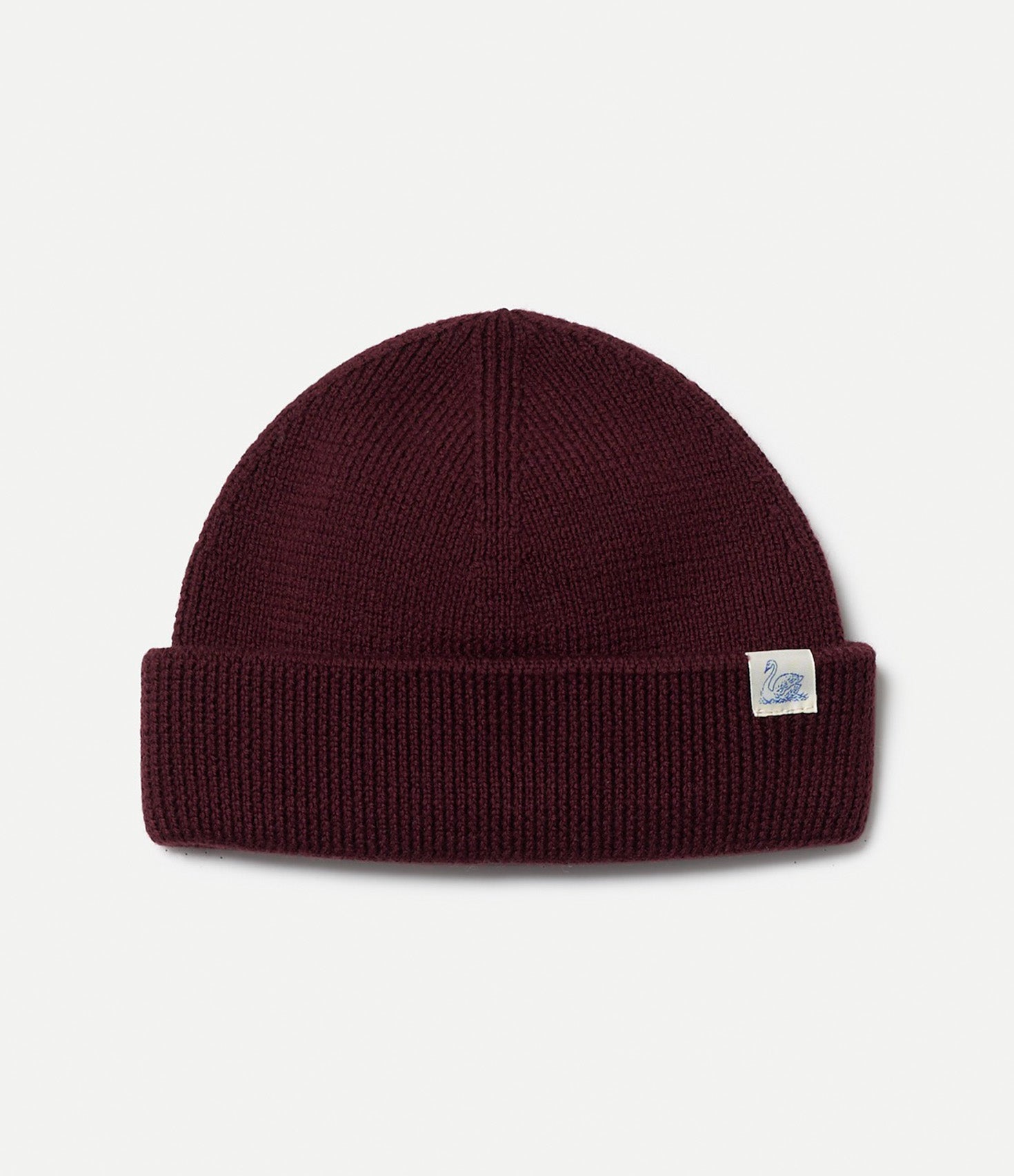 Maroon beanie with a small logo on a light gray background