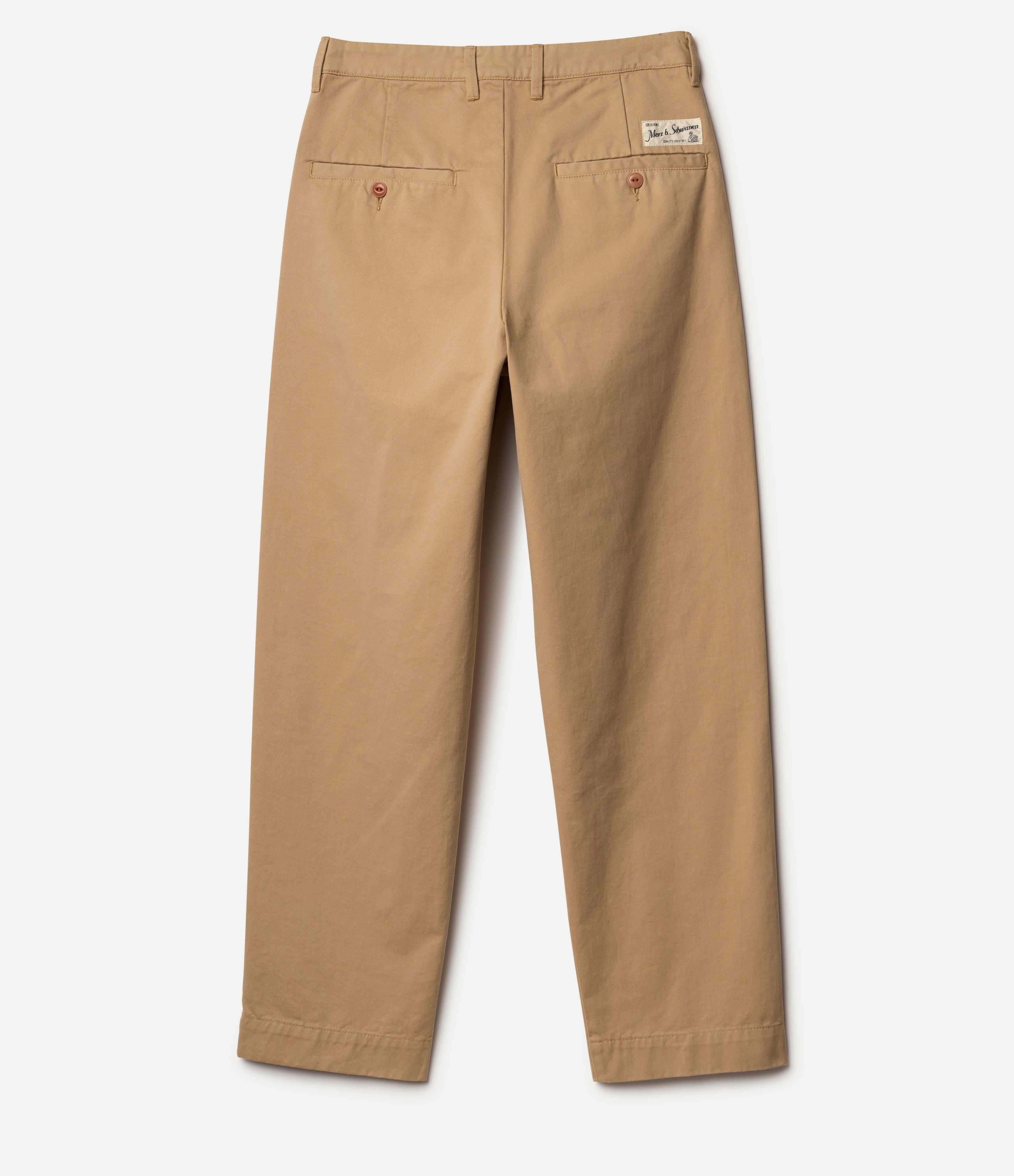 Backside of beige twill pants with a Merz b. Schwanen logo on a white background