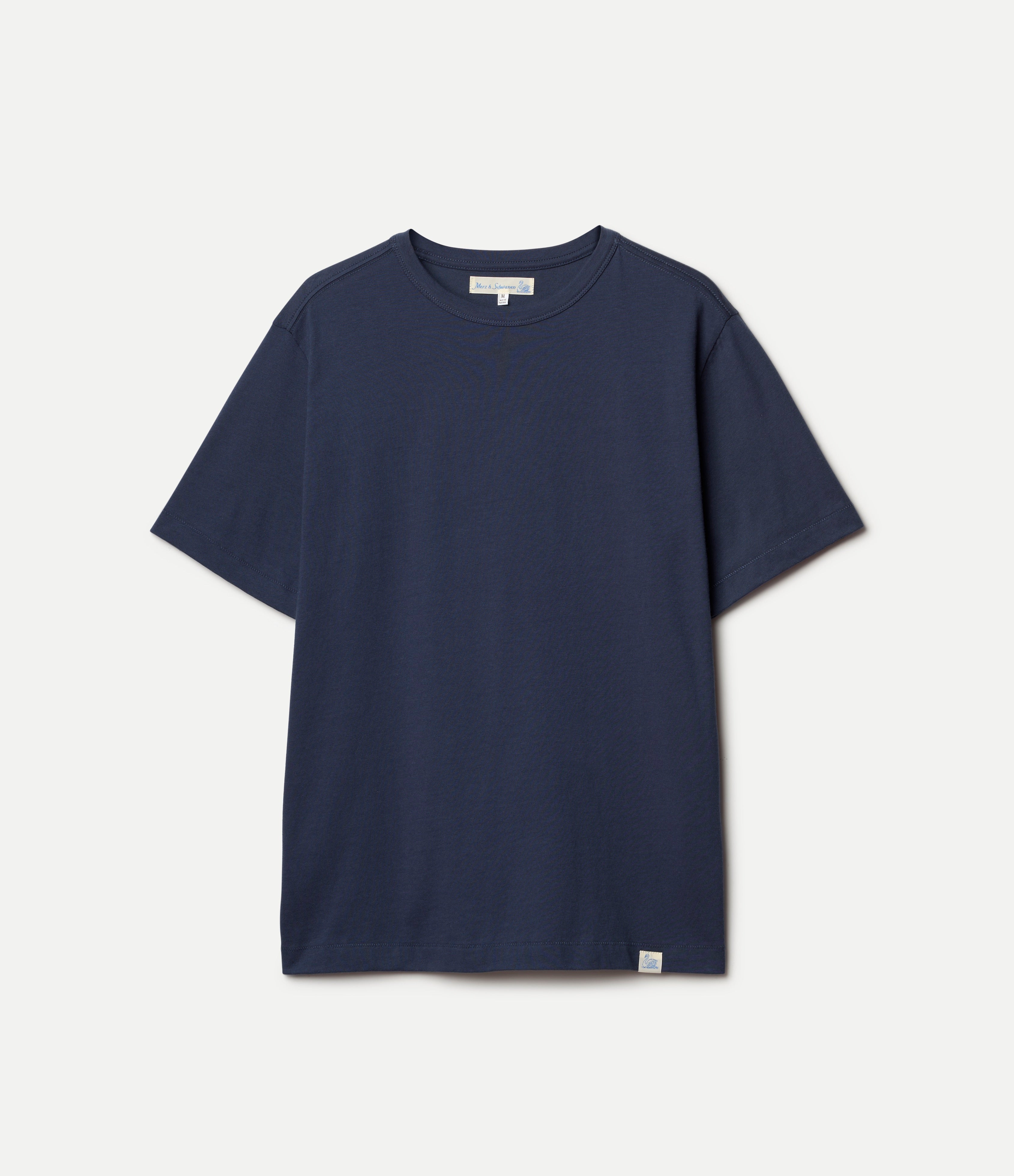 Indigo blue t-shirt on a light gray background