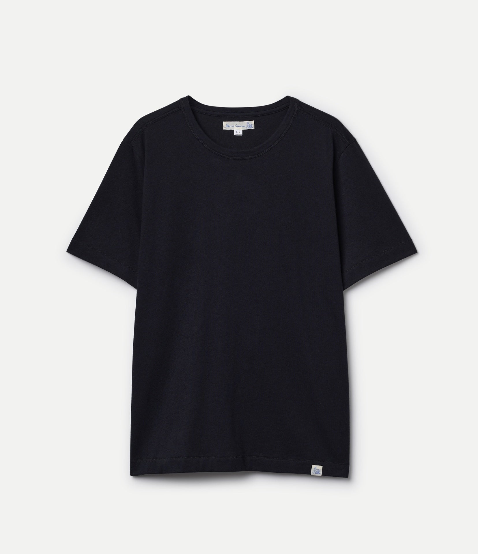 Black crewneck t-shirt on a light gray background