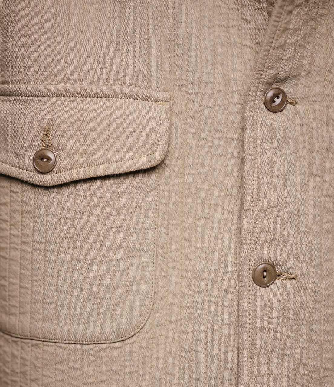 Close upshot of khaki padded cotton fabric