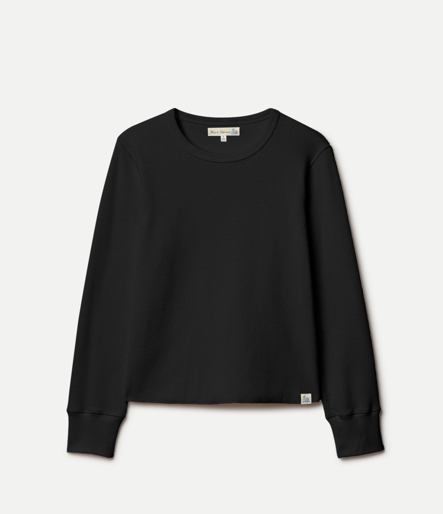 Black longsleeve thermal shirt on a light gray background